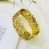 Pulsera transfronteriza europea y americana de acero de titanio dorado para mujer, creativa, moderna, ancha, hueca, con hojas, para pareja, abierta, joyería