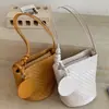 Bolso cubo tejido de nicho casual estilo coreano para mujer, nuevo bolso de hombro de moda, bolso de hombro y cruzado para commuting