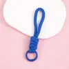 Llavero cordón de cuerda trenzada de nailon para hombres y mujeres hebilla de montañismo cuerda de mano para parejas colgante de bolsa teléfono llave lazo