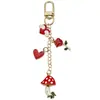 Llavero de corazón de hongo rojo y corazón de rosa transfronterizo para bolso de mujer colgante mejor amiga pequeño regalo