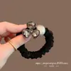 Prendedor de Cabelo Flor de Trevo com Strass Dongdaemun Corda Elástica Preta para Coque Prendedor de Cabelo Fashion para Rabo de Cavalo