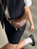 Bolso de nicho transfronterizo para mujer 2026, bolso versátil de hombro y cruzado, bolso de cuerno moderno y súper popular, bolso nuevo y moderno ligero