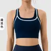 Sujetador deportivo de bloques de color, con copas fijas y espalda cruzada, de alta elasticidad, diseñado para mujeres jóvenes, adecuado para correr, fitness y secado rápido, se puede usar como capa exterior