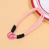 Colgante de juguete de peluche con cordón tejido multicolor, correa de muñeca para teléfono móvil, correa corta de mano con doble hebilla, accesorio de cordón de nailon