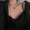 Collar de lujo ligero con piedras preciosas de cristal negro de doble capa apiladas, estilo simple, moderno y elegante.