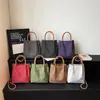 Bolso de mano de cuadros de nicho estilo coreano para mujer, nueva moda primavera 2026, simple y elegante, bolso de hombro y cruzado de alta gama