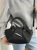 Bolso de hombro moderno y sencillo, nuevo bolso de mano para el verano de 2026, bolso tipo cubo informal de tendencia estilo coreano para mujer
