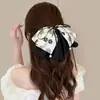Pinza de Lazo de Gama Alta para la Mitad Trasera del Cabello de Mujer 2025 Nuevo Elegante Pinza para Cola de Caballo Pasador Adorno para el Cabello