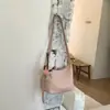 Bolso de moda coreana elegante para mujer con estampado de lichi, bolso tipo dumpling, nuevo bolso de hombro y cruzado simple de verano 2026 para el día a día