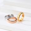 Comercio electrónico transfronterizo neutral simple estilo lujo ligero arena perlada esmerilada anillo de titanio y acero giratorio para aliviar el estrés joyería de mano moda