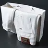 Jeans Blancos de Alta Gama Europeos Lyocell Tencel Tres Pruebas para Hombre en Otoño Nuevo Ajuste Delgado Pierna Pequeña Elásticos Casual Tendencia