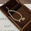 Pulsera Retro Literaria de Zirconia Gatito Perla Brazalete de Lujo Ligero Sentido de Alta Gama Simple Moda Temperamento Versátil Joyería de Mano Mujeres