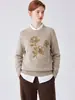 Cardigã de Malha Floral Estilo Francês Temperamento para o Trabalho Feminino 2026 Outono Novo Design Sense Bordado Floral Top de Lã