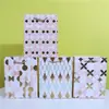 Bolsa de Papel Diamantada Bronceada en stock Flores al por Mayor Bolsa de Papel de Cartón Blanco Exclusiva Transfronteriza para Minoristas