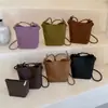 Bolso Tejido para Teléfono Móvil de Nicho para Viajes Diarios para Mujer 2026 Nuevo Bolso Cubo de Mano Simple Retro Bolso de Hombro Cruzado