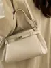 Bolso de Hombro de Moda de Estilo Coreano de Alta Apariencia para Mujer 2026 Primavera Nuevo Estilo Bolso Cuadrado Pequeño Cruzado Simple y de Moda