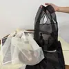 Fabricante de Shenzhen Bolso de Muñeca de Organza Encriptado Personalizado Simple y Portátil Transparente Color Sólido Borde con Candado Bolso de Mano Bolsa de Gasa