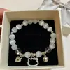 Pulseira de Vidro com Fragmentos de Jade Borboleta Estilo Novo para Mulheres, Pulseira de Girassol de Cristal Colorido Explosivo de Nicho, Em Estoque para Venda no Atacado para Barracas de Mercado
