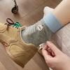 Calcetines medias de mujer combinación de colores bordado de animales calcetines de dibujos animados Corea del Sur punto de color calcetines de felpa azules calcetines de mujer al por mayor