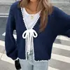 Nuevo cárdigan de punto de moda transfronteriza europea y americana para mujer, otoño e invierno, suéter con lazo, color liso, manga larga holgada, abrigo.