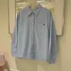 Camisa de Rayas Verticales con Bordado de Bolsillo Estilo Coreano Nueva para Primavera para Mujer, Blusa Elegante y Casual de Corte Holgado para el Trabajo y el Ocio, Transfronteriza
