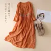 Vestido bordado estilo étnico para la primavera de 2026 con temperamento artístico, cuello redondo, mangas de tres cuartos, falda de longitud media