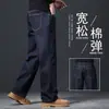Nuevos pantalones vaqueros de alta gama para otoño 2026 para hombre, estilo recto holgado, colección de primavera y otoño, lavados y elásticos, pantalones casuales para hombres de mediana edad