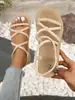 Sapatos baixos outono e verão nova moda sandálias femininas para exterior estilo de férias chinelos de tiras cruzadas praia Xia Wei