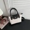 Bolso de teléfono de moda para mujer, nueva colección 2026, bolso de hombro de gran capacidad, elegante bolso tote, bolso de mano casual versátil