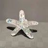 Estilo marino transfronterizo nuevo artículo charm de zapato de estrella de mar concha colgante azul marino hebilla de cordón de zapato compatible con papá de entrenamiento alemán zapatos de ballet