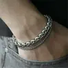 Explosiones de deseos pulsera de acero inoxidable para hombre de tres colores dorado, plateado y negro dominante europea y americana pulsera de encanto de personalidad para hombre joyería