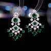 Aretes de aguja de plata s925 de lujo ligero de alta gama al por mayor con incrustaciones de circonita en forma de abanico vestido de banquete con temperamento aretes de novia