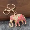 Llavero de elefante con pedrería transfronterizo, colgante de accesorio para coche de metal, llavero creativo estilo coreano, pequeño regalo de Navidad