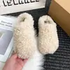 Zapatos casuales nuevos de otoño e invierno de suela gruesa simples 2026 zapatos de vestir únicos puntera peluda versátil zapatillas de media caña para mujer persona perezosa