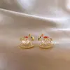 Brincos de Cavalo de Troia Vazados com Zircônia Dourada para Mulheres, Luxo Acessível, Brincos de Design Único, Tendência de Brincos de Nicho Exquisitos e de Alto Padrão