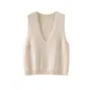 Esencial para capas: Chaleco de punto sin costuras con cuello en V 100% lana merino, un jersey liso versátil y elegante