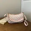 Bolso pequeño cuadrado fresco estilo coreano al por mayor para mujer, nuevo bolso de hombro texturizado a cuadros de verano 2026, bolso cruzado para el trabajo