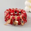 Bestseller transfronterizo Pulsera con colgantes de ala, corazón y ojo turco estilo bohemio, pulsera de cordón elástico de múltiples capas