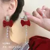 Pendientes festivos de texto de Año Nuevo Rojos Pendientes del año del dragón del Zodiaco Alto sentido sentido de diseño nicho Pendientes de otoño e invierno de Año Nuevo