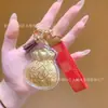 Colgante de Oro Puro 999 Bolsa de la Suerte Llavero de Cuero Colgante para Bolso Cadena para Teléfono Móvil Colgante para Bolso Mayoreo