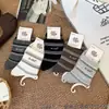Calcetines Deportivos de Caña Alta para Mujer, Calcetines de Dibujos Animados de Alta Elasticidad, Calcetines de Algodón Peinado Todo en Uno Nai Fu Kelu Li Venta al por Mayor