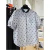 Camisa de manga corta con cuello estilo coreano súper popular y rejuvenecedora para mujer, nuevo modelo de verano, top casual de algodón y lino con lunares extremadamente elegante
