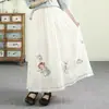 Falda midi bordada artística y vintage de algodón y lino para mujer, estilo chino, corte holgado, adelgazante, falda de línea A bordada con un dobladillo completo