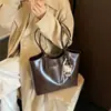 Bolso Retro de Gran Capacidad para Mujer 2026 Nuevo Bolso de Hombro Casual para el Trabajo y el Viaje Bolso Tote Texturizado Simple Versátil