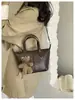 Bolsa Tote de Grande Capacidade de Nicho de Luxo para Mulheres Nova Outono/Inverno 2026 Bolsa Grande Elegante Simples Bolsa de Ombro Bolsa de Braço