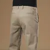 Ropa de Hombre Fengshe / 2026 Otoño-Invierno Nuevo Algodón Elástico Versátil Ligero Negocio Recto Delgado Casual Pantalones Largos para Hombre