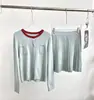 Cardigan de Punto de Otoño 2026 Nuevo, Mezcla de Lino, Estilo Universitario, Bloques de Color, Cuello Redondo, Top con Cintura Elástica, Minifalda Plisada