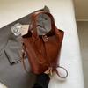 Bolso de textura popular de este año para mujer otoño 2024 nuevo bolso bandolera de ocio retro portátil personalidad bolso de cubo