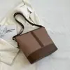 Cross2026 Otoño Nueva Moda Retro Estilo Casual Sencillo Bolso Cubo Patchwork Bolso de Hombro Cruzado Sencillo