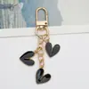 Amazon Nuevo Colgante de Amor Llavero Colgante Chica Dulce Lindo Aleación de Goteo de Aceite Llavero Accesorios para Bolsos